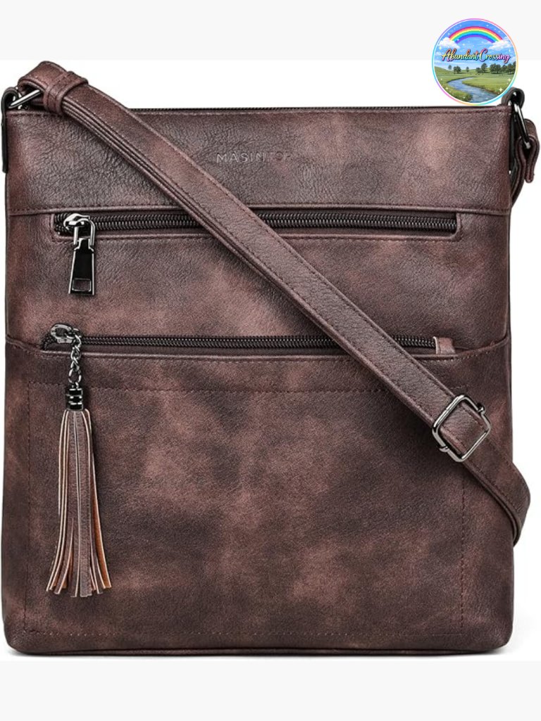 Multi Pocket Crossbody Bag With Adjustable Strap And Tassel